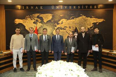 rektor-alkis-tan-ilahiyat-fakultesi-dergi-editorlerine-tesekkur-belgesi-